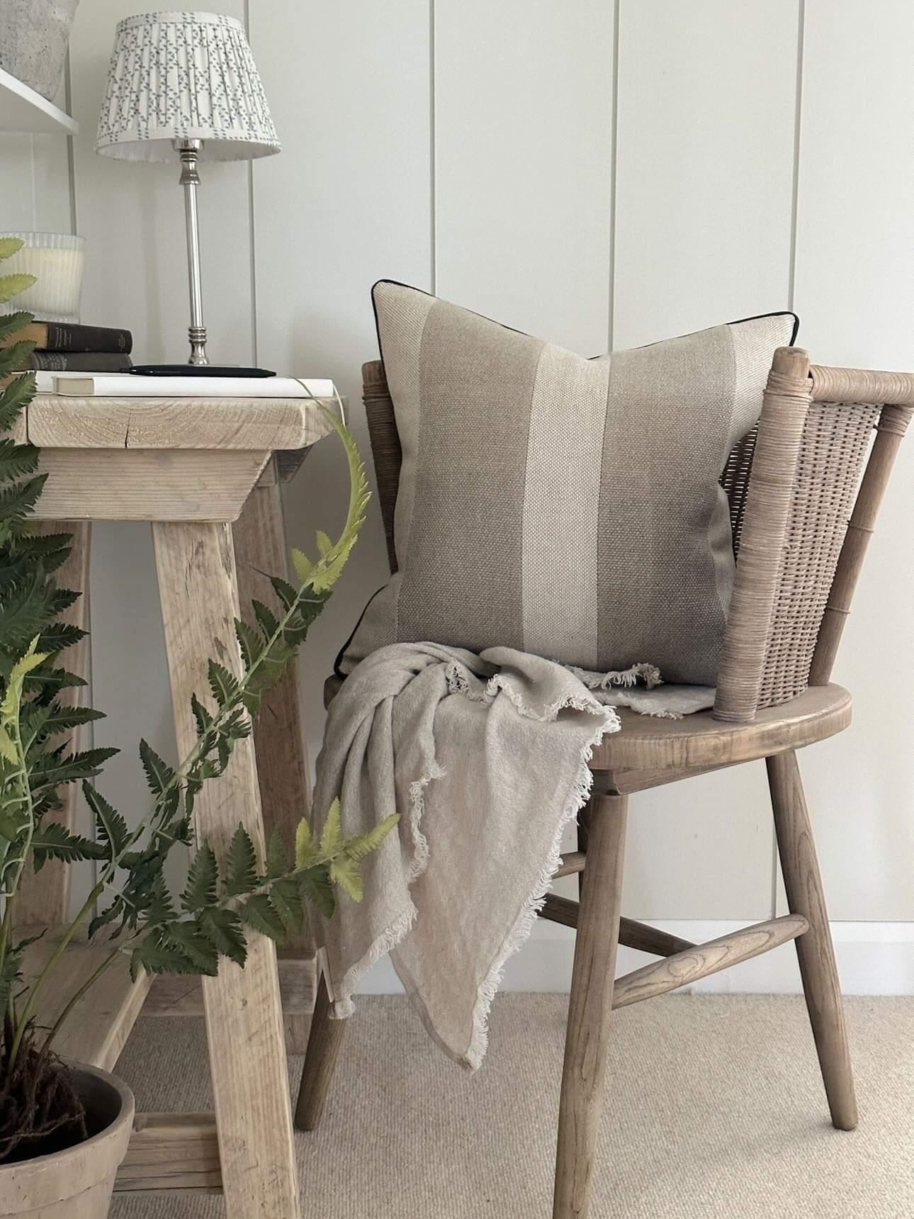 Statement striped linen cushion cover in neutral earthy tones