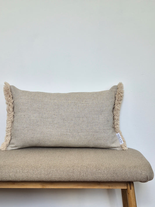 Oblong oatmeal linen cushion cover with fringed edges