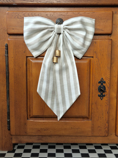 large bow with cow bells 