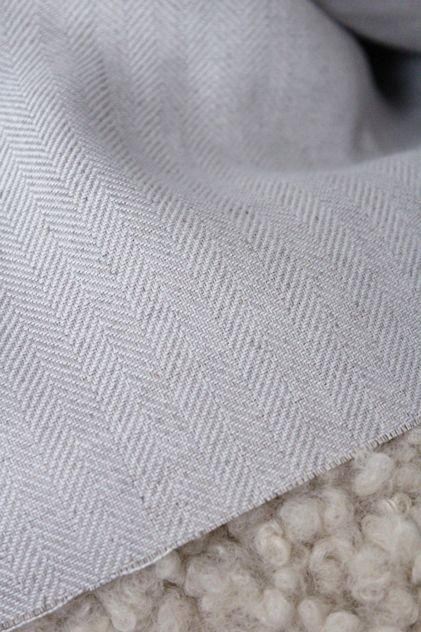 pure natural flax linen, grey with purple undertone, herringbone weave texture, medium weight fabric