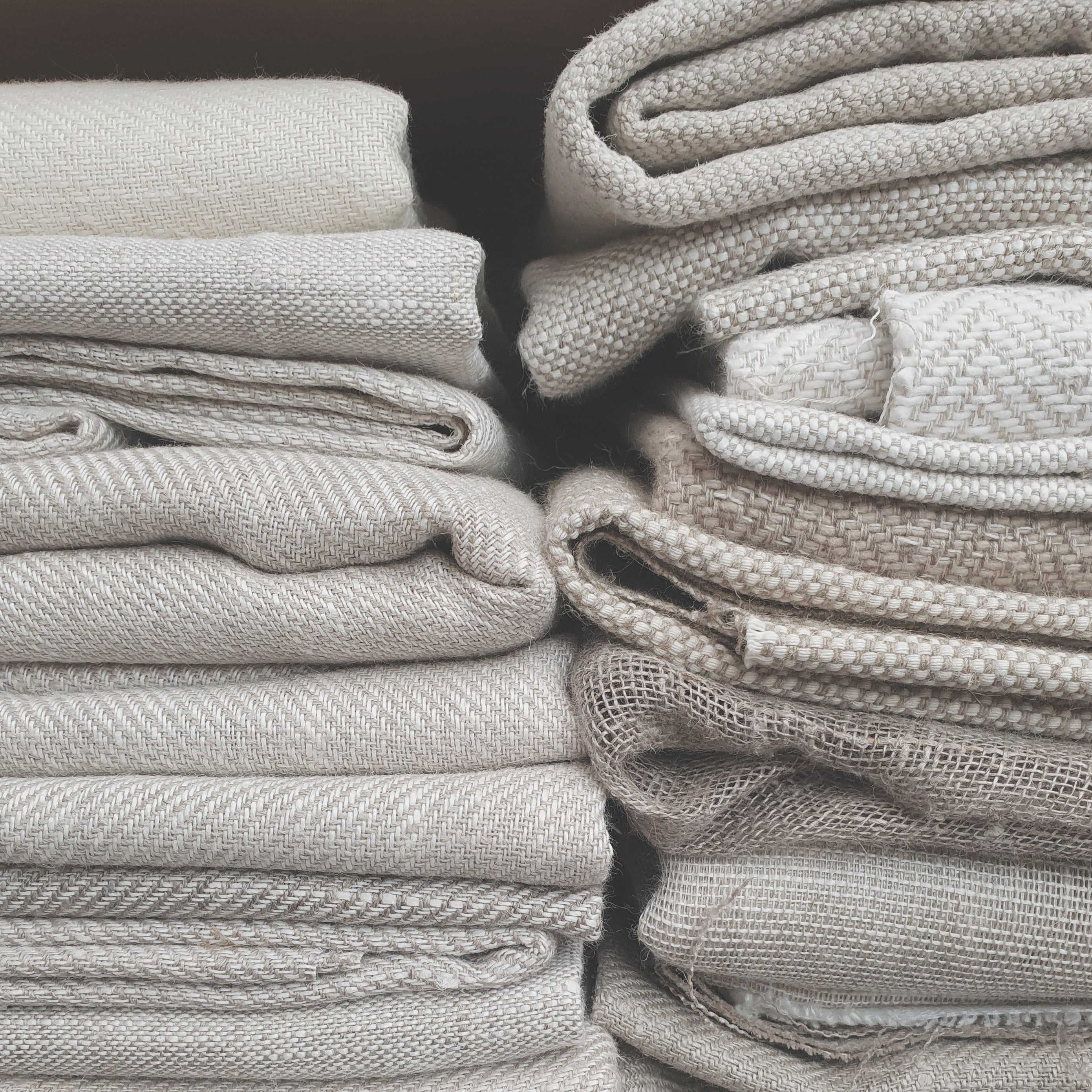 collection of pure linen fabrics sold by the metre in various textures and weights uk