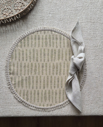 Mia round linen placemat in naturals tone and soft sage green colour with linen fringe trim