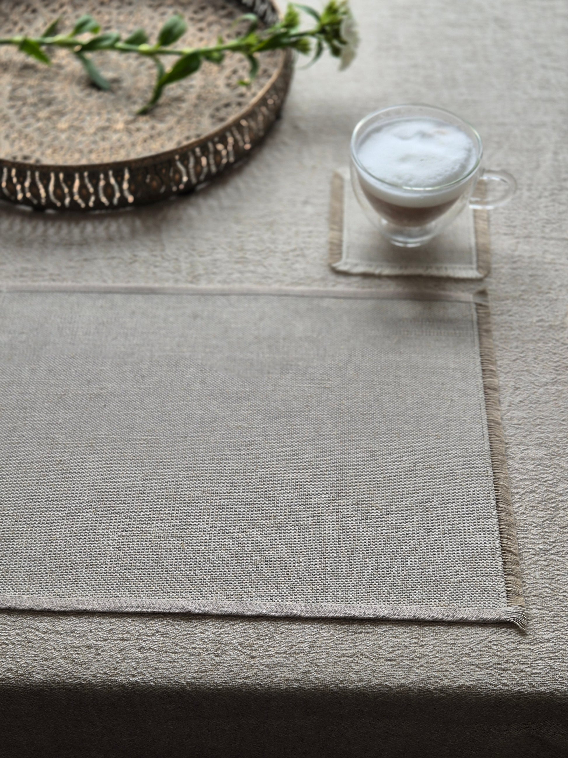 Sara oatmeal pure linen textured placemat with hand brushed edges.