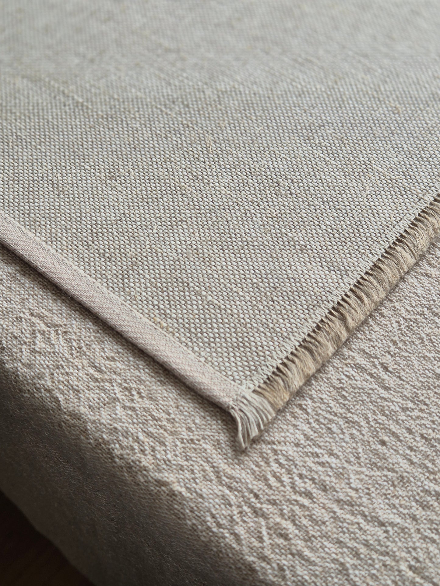 Sara oatmeal pure linen textured placemat with hand brushed edges.